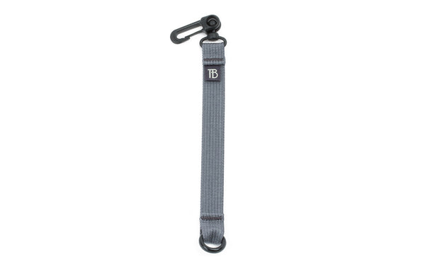 An 8-inch Northwest Sky (light grey) Key Strap with a snaphook at one end and an o-ring at the other.